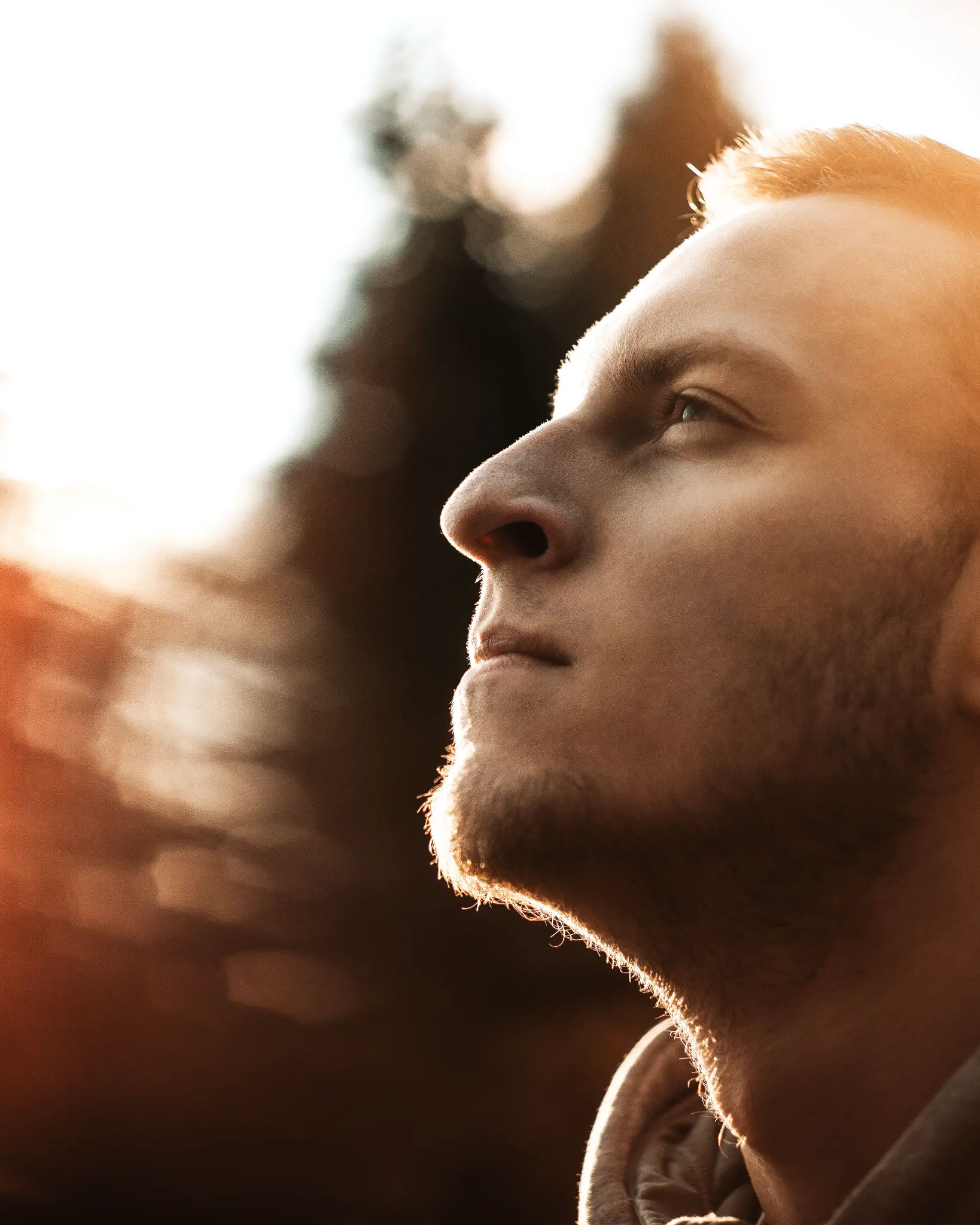 Man looking upward with resilience — addiction recovery therapy